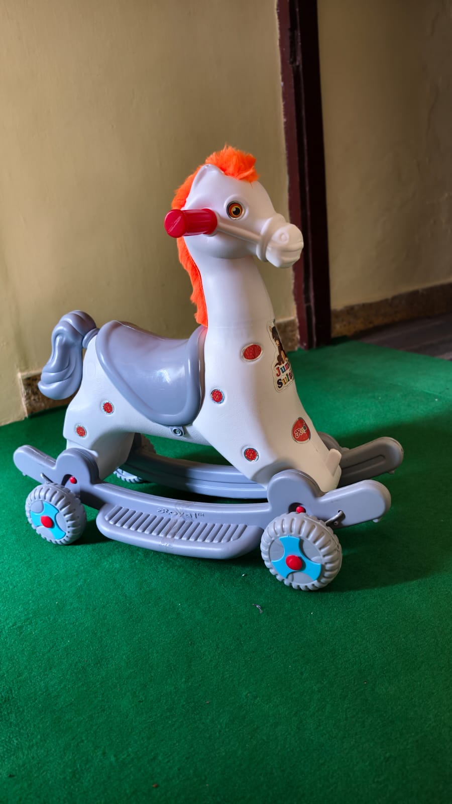 smiling children lying on grass